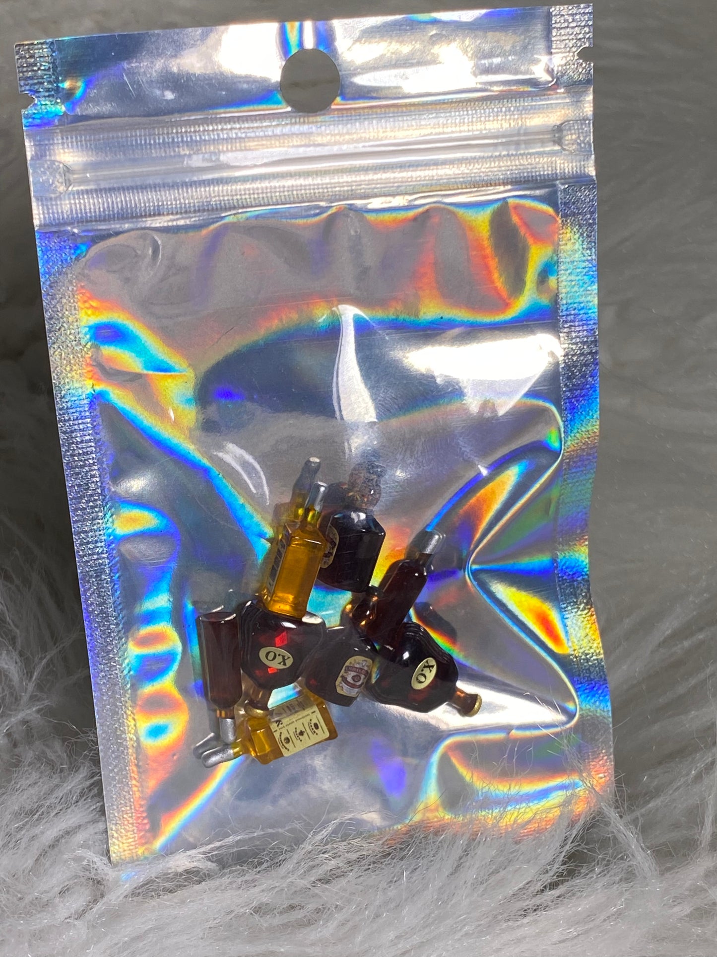Assorted Acrylic Alcohol Bottles